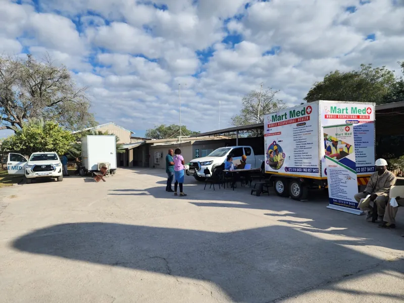 The mobile clinic trailer parked at a worksite
